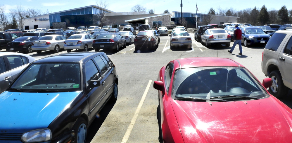 FULL HOUSE: A T-Mobile employee winds his way through one of the full parking lots at FirstPark in Oakland. T-Mobile employs nearly 600 people, which makes up most of the employment total at the business park.