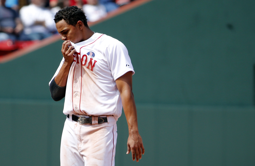 Red Sox’s Xander Bogaerts pauses after being caught in a rundown to end the eighth inning during their 7-6 loss to the Orioles on Monday.