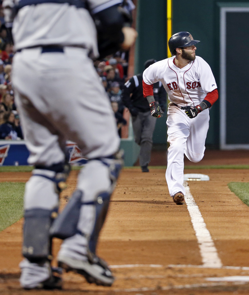Red Sox second baseman Dustin Pedroia runs home to score on a single by A.J. Pierzynski in the first inning Wednesday.