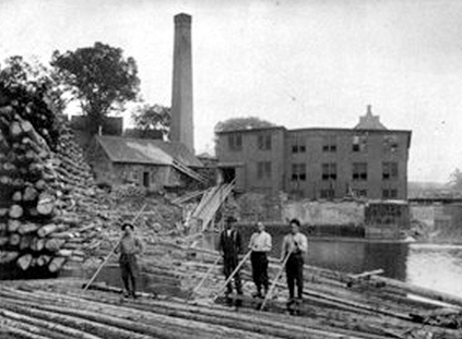 LOG WORK: Log drives at Skowhegan Pulp Company at Skowhegan Falls around 1900.
