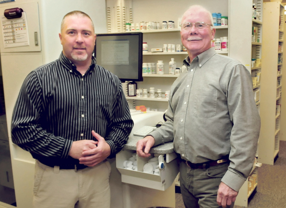 Staff photo by David Leaming BUSINESS PERSON OF THE YEAR: Shane Savage, left, and his father, Bud Savage, will receive the Business Person of the Year award from the Mid-Maine Chamber of Commerce Tuesday.