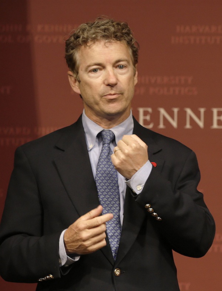 Sen. Rand Paul, R-Ky. gestures as he emphasizes a point during his public address at the John F. Kennedy Jr. Forum Institute of Politics at the Harvard Kennedy School, Friday April 25, 2014, in Cambridge, Mass. Paul is speakign the Maine GOP’s state convention Saturday.