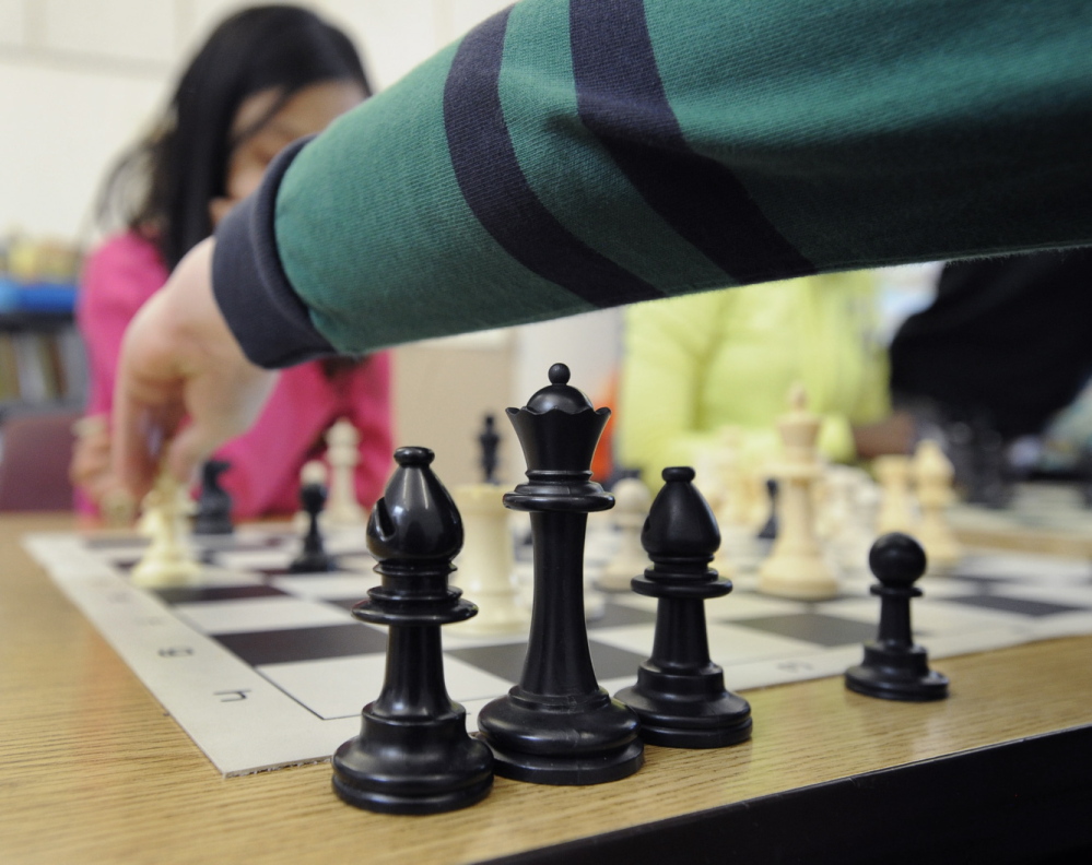 POVERTY DISRUPTS EDUCATION: A chess tournament at Portland’s East End School, where 74 percent of students qualify for nutrition assistance. It’s no coincidence that this school got an F in last year’s state rankings: Most students who live in stressed environments aren’t equipped to learn at a high level.