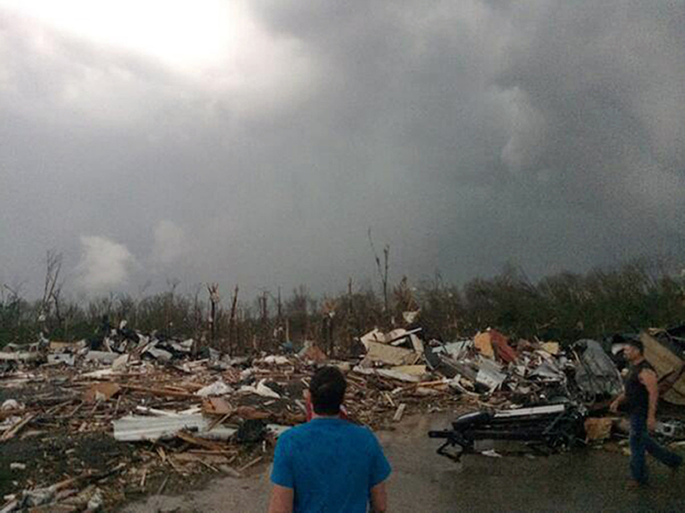 This photo provided by James Bryant shows damage from Sunday’s tornado in Mayflower, Ark. The Arkansas twister shredded cars, trucks and 18-wheelers stuck along Interstate 40 north of Little Rock.