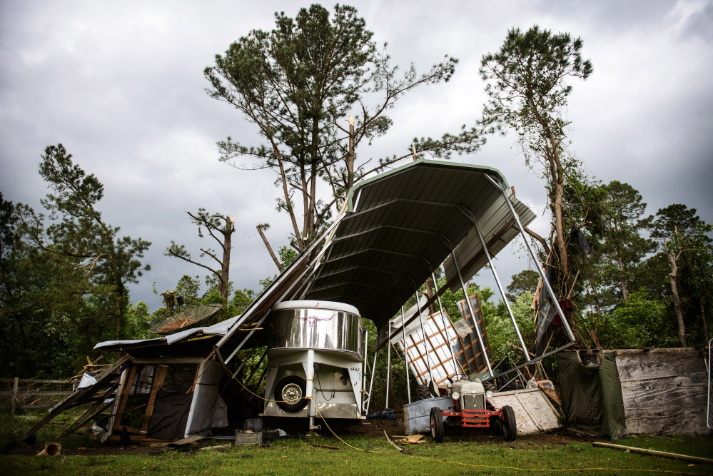 Larry Smith’s camper shelter near Stedman, N.C., was destroyed after a possible tornado passed by his house Tuesday. At least five counties in eastern North Carolina reported tornadoes on Tuesday.