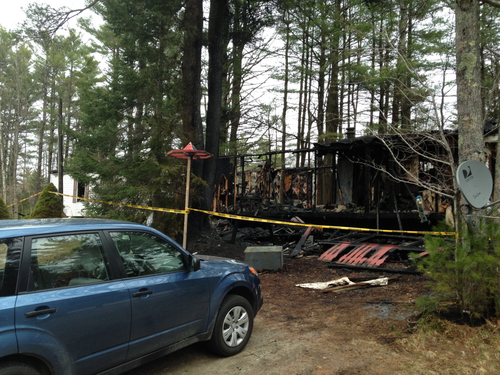 IN RUINS: This home at West Village Trailer Park was destroyed by fire around 1 a.m. Wednesday, according to Monmouth Fire Chief Dan Roy.