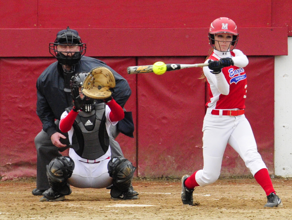 Staff photo by Joe Phelan Messalonskee center fielder Kylee Knight hits a single early in the game on Wednesday April 30, 2014 at Cony Family Field in Augusta.