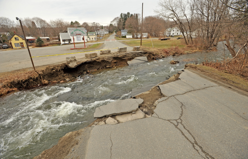 DEXTER FLOODING: A week after the east branch of the Sebasticook River flooded, Lincoln Street in Dexter remained impassible.