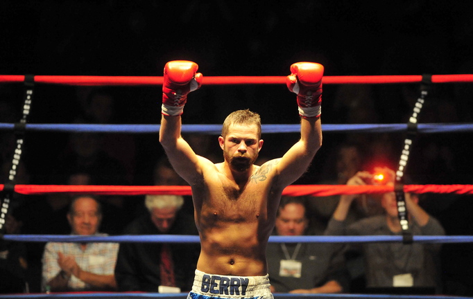 Brandon "The Cannon" Berry, of West Forks, celebrates his victory third round KO victory over Paul Souza, of Somerville, Mass., in a four-round professional junior welterweight fight at the Portland Expo on Nov. 16, 2013.