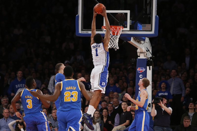 In this December 2013 file photo, Duke's Jabari Parker (1) dunks against UCLA during the second half of an NCAA college basketball game. Parker has announced he will enter the NBA Draft after one season at Duke. Men's college basketball;College basketball;Basketball;Sports;Men's basketball;College sports;Men's sports