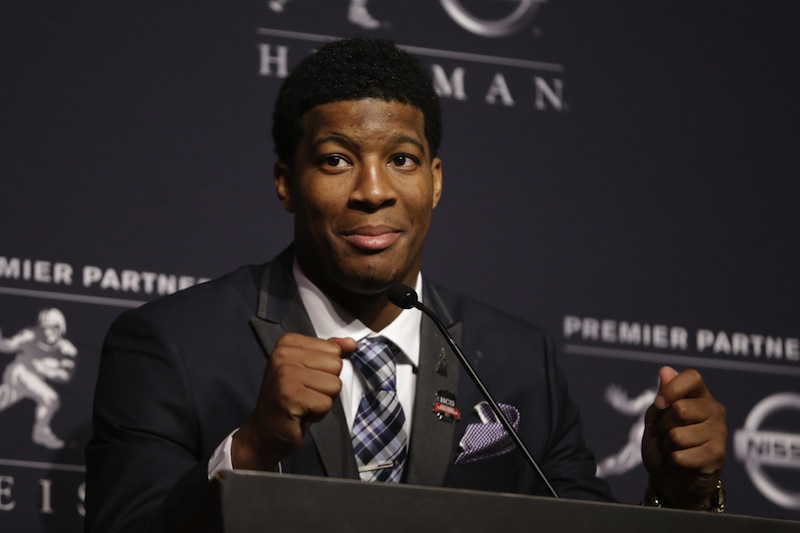 In this December 2013 file photo, Florida State quarterback Jameis Winston talks to reporters after winning the Heisman Trophy.