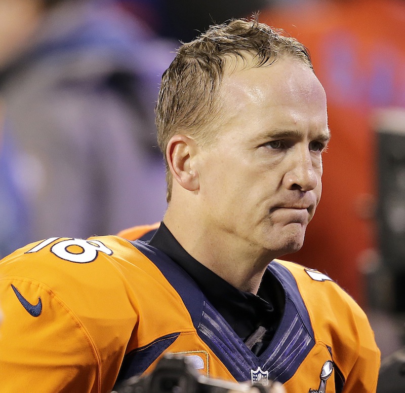 DDenver Broncos' quarterback Peyton Manning reacts after a 43-8 Super Bowl thrashing by the Seattle Seahwaks. NFLACTION13;