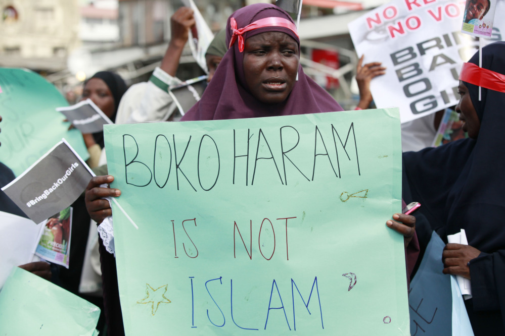 A woman attends a demonstration calling on the government to increase efforts to rescue the 276 missing kidnapped school girls of a government secondary school Chibok, in Lagos, Nigeria, on Monday.