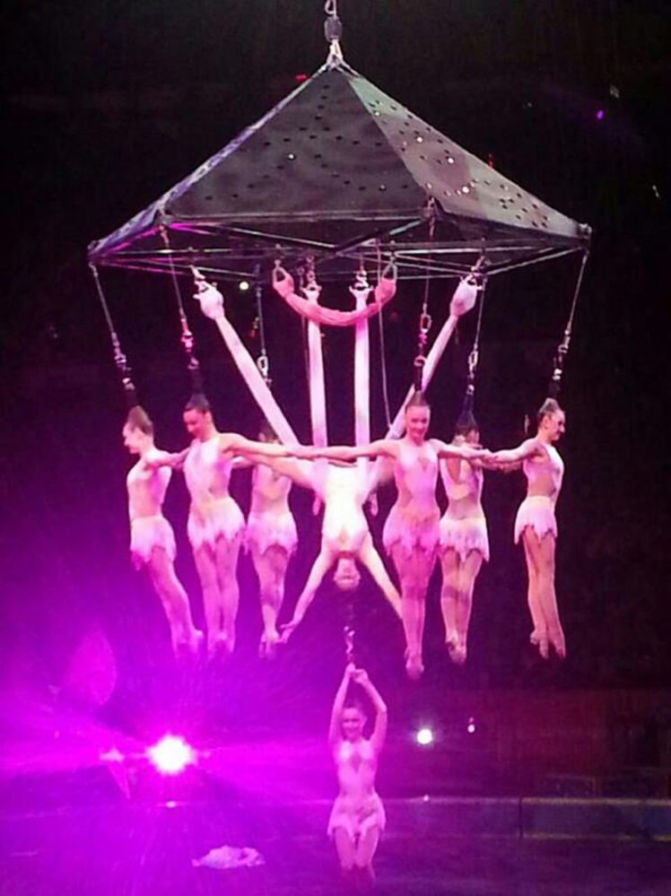 In this photo provided by Frank Caprio, performers hang during an aerial hair-hanging stunt at the Ringling Brothers and Barnum and Bailey Circus, Friday, in Providence, R.I.