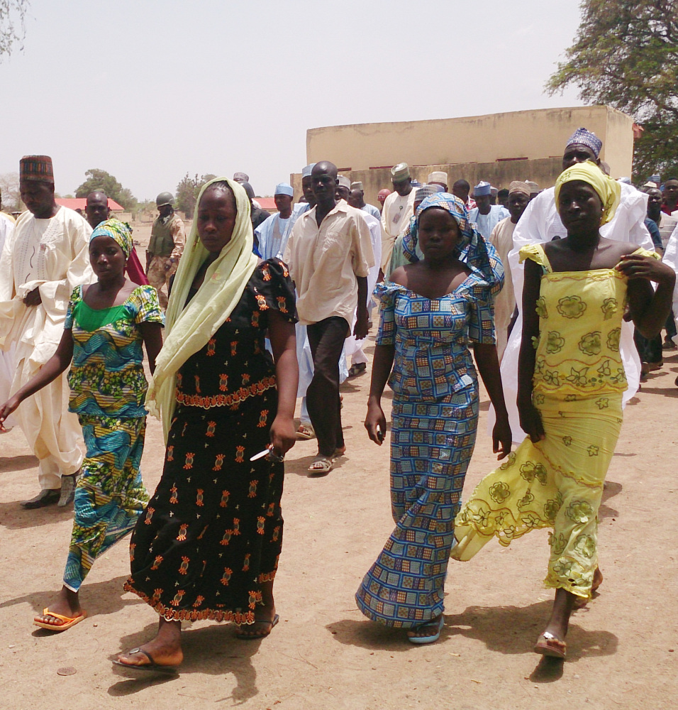 This April 21, 2014, photo shows four of the 53 students of government secondary school Chibok who escaped their Islamic extremist kidnappers. The girls did not want to be identified by name and refused to speak to reporters when they were photographed.