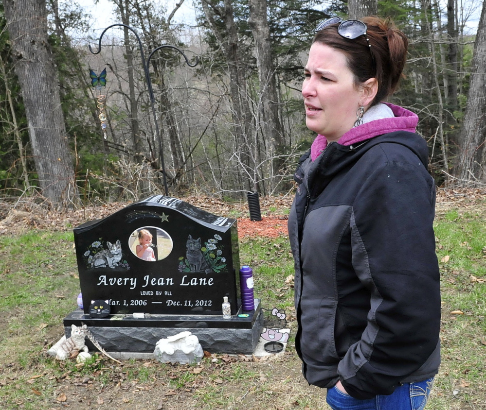 HEARTBREAKING: Tabitha Souzer, Avery Lane’s mother, speaks at her daughter’s gravesite at the Friend’s Cemetery in Fairfield on Tuesday. Souzer said the gravesite has been vandalized three times, most recently over the weekend.