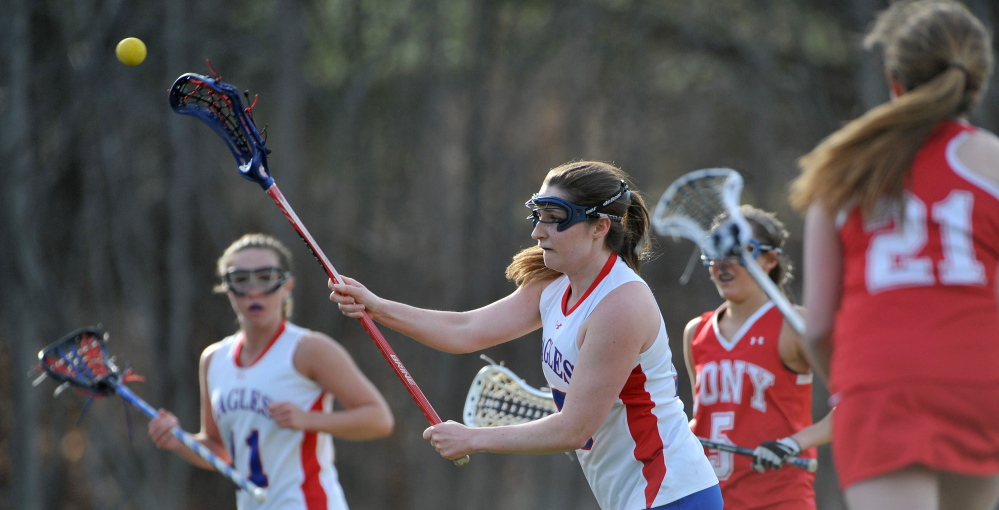 MULTITALENTED: Messalonskee High School’s Ally Fischang, 15, credits swimming and cross country running in helping with her lacrosse game. Fischang, a senior, is the Eagles’ top scoring threat.