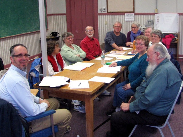 NEIGHBORS: The initial group of volunteer residents with the New Sharon Village Elders Club seen at their May 1 meeting. The group is trying to revive a culture of neighbors helping neighbors in need.