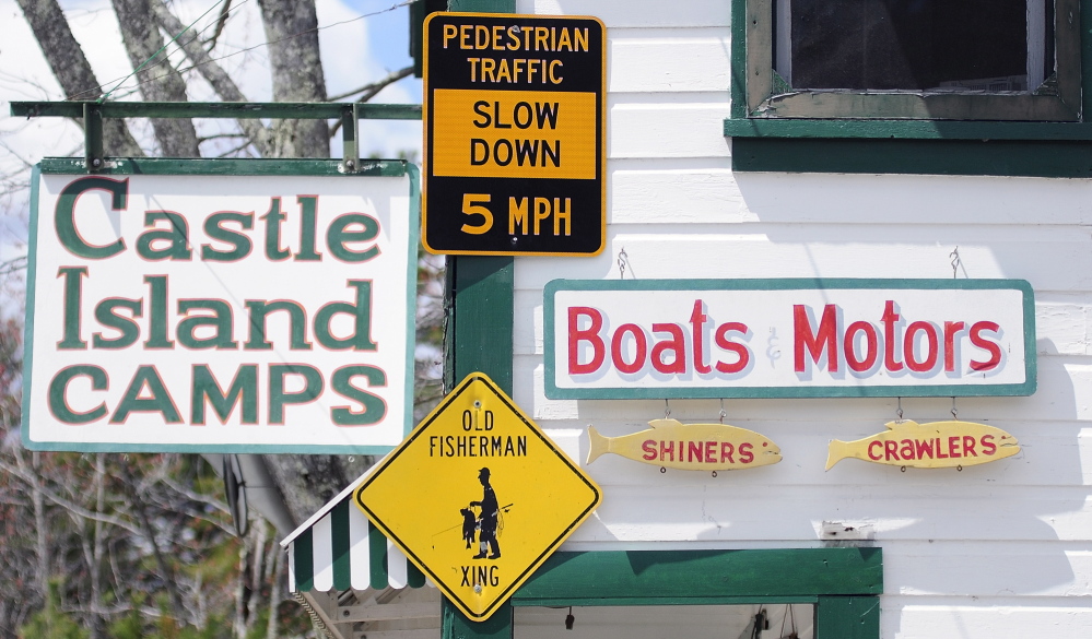 NEW LOCATION: The “Pedestrian Traffic Slow Down 5 MPH” sign that had been on a post near Castle Island Camps is now hanging on the building in Belgrade.