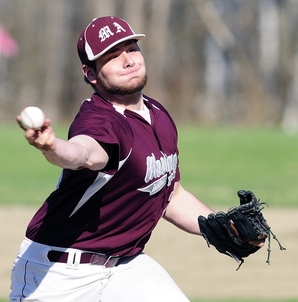 Monmouth Academy pitcher Nate Gagne serves up the ball with a side arm delivery during a game on Wednesday May 7, 2014 at Monmouth Academy. (Photo by Joe Phelan/Staff Photographer)
