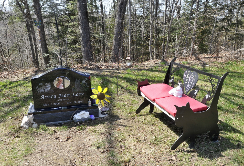 VANDALIZED: Decorations at the grave site of 6-year-old Avery Lane, shown Thursday, have been restored since the site was vandalized recently.