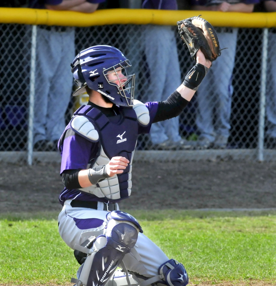 Staff photo by David Leaming Waterville baseball catcher Aidan FitzGerald makes a catch during a recent game against Gardiner.