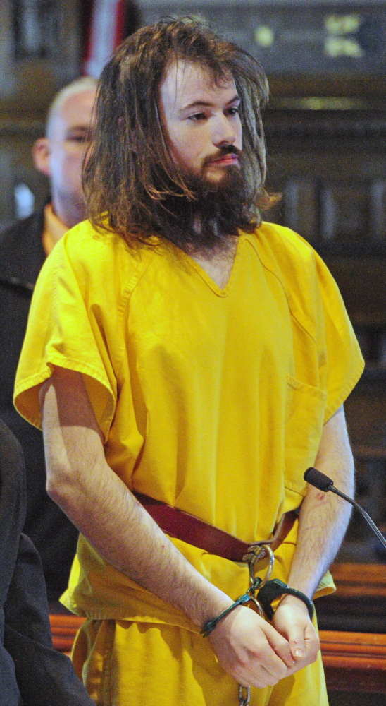 SLAYING SUSPECT: Leroy H. Smith III stands on Thursday in in Kennebec County Superior Court during his initial court appearance.