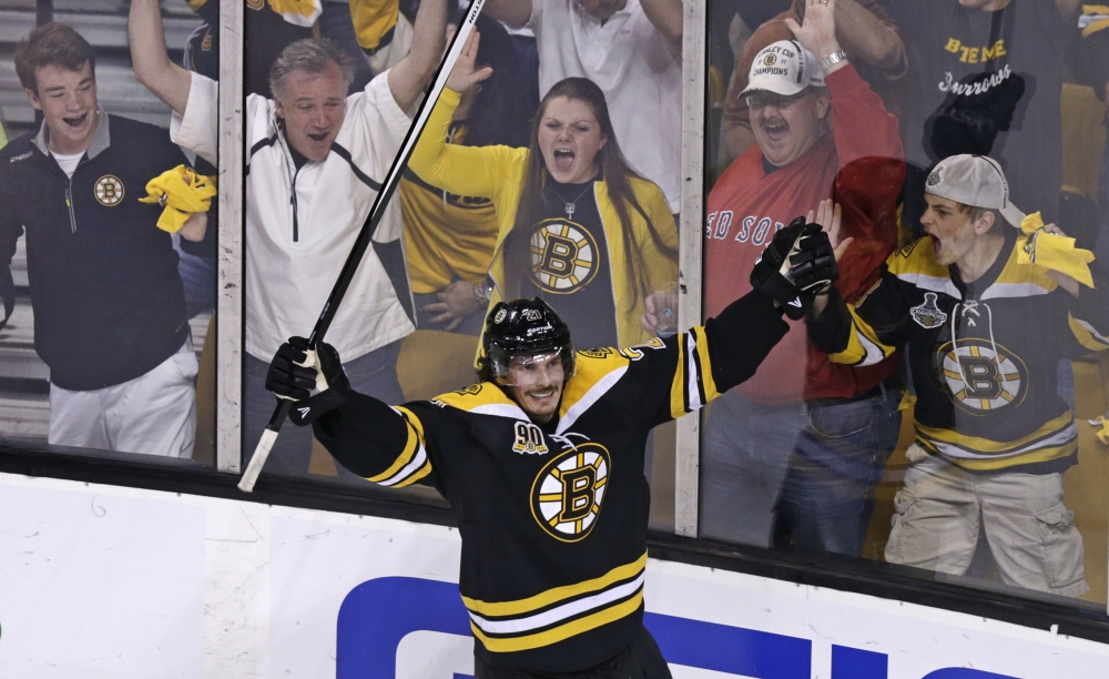 Boston Bruins left wing Loui Eriksson celebrates his goal against Montreal Canadiens goalie Carey Price in the third period of Game 5 in the second-round of the Stanley Cup playoff series in Boston on Saturday.
