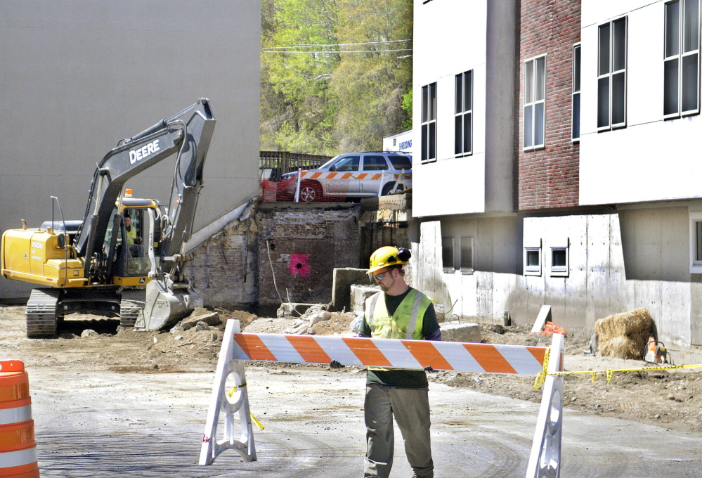 SPRUCING UP: Construction has commenced on the south side of Market Square in downtown Augusta, where officials and merchants hope a grassy park will encourage people to spend more time in the heart of the city.