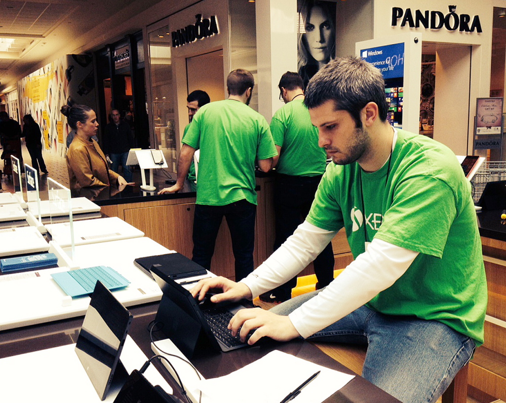 Javis Hearne, assistant manager of the new Microsoft store at the Maine Mall, was on the job with other employees Wednesday preparing for Saturday’s opening.