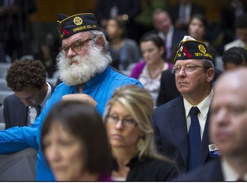 Members of the American Legion listen as Veterans Affairs Secretary Eric Shinseki testifies at a Senate committee hearing on the state of health care for veterans. Shinseki said he was “mad as hell” about allegations that some VA hospitals falsified reports so it looked like their wait lists were shorter.