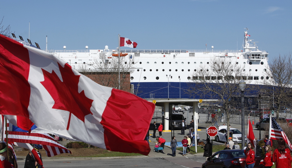 Residents of Yarmouth, Nova Scotia, welcome the Nova Star cruise ship Friday morning as it arrives from Portland on its maiden voyage.