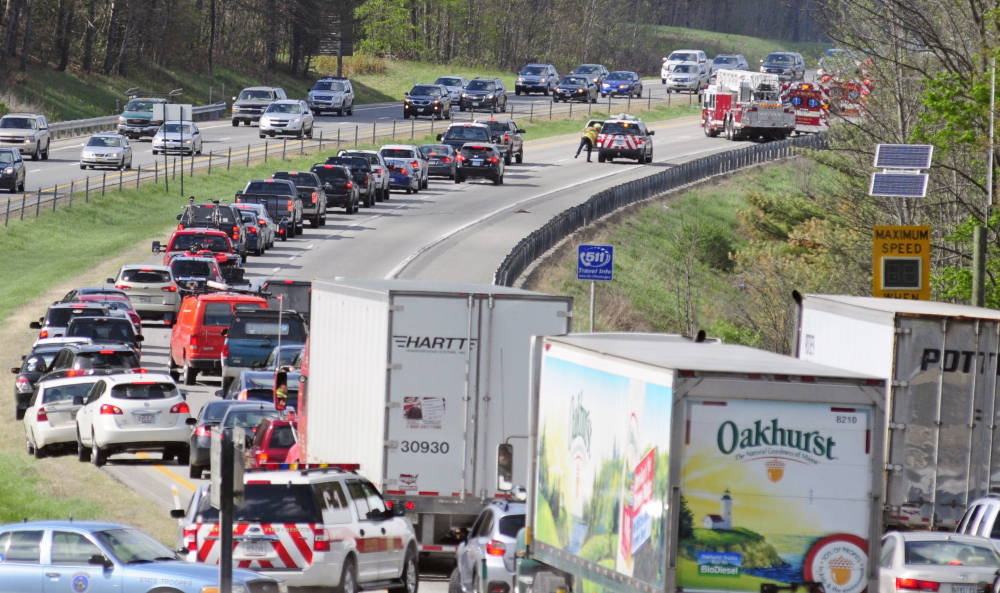 PRECAUTIONS: Traffic backs up on northbound Interstate 95 between exits 109 and 112 Friday as firefighters worked to extinguish a brush fire.