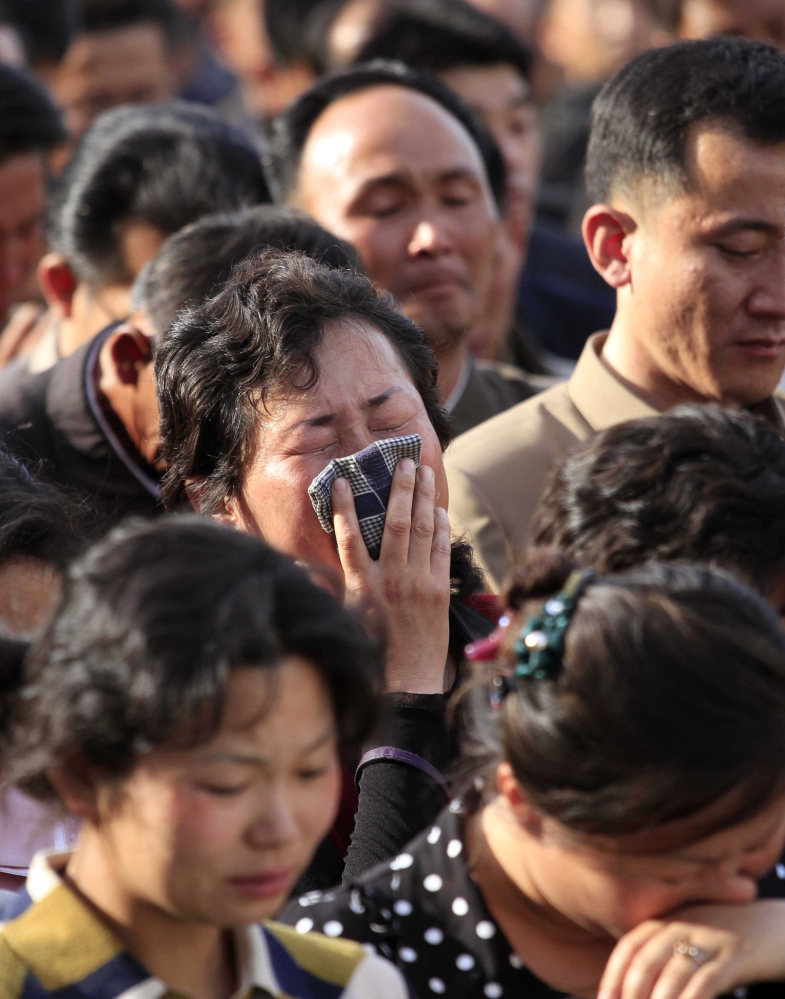 Families of victims of an accident at an apartment construction site in Pyongyang, North Korea, grieve during a gathering in the capital where senior officials apologized and took responsibility.