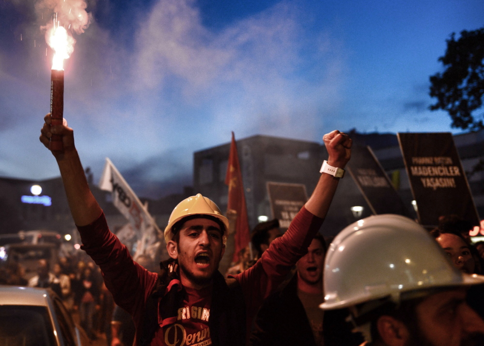 Thousands of protesters march to condemn the Soma mine disaster in Istanbul, Turkey, on Sunday.