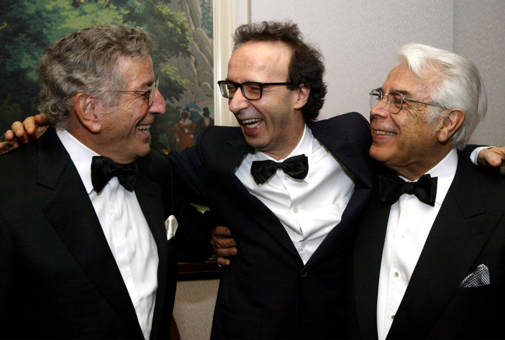 Singer Jerry Vale, right, is shown with singer Tony Bennett, left, and director Roberto Benigni. Vale has died at age 83.