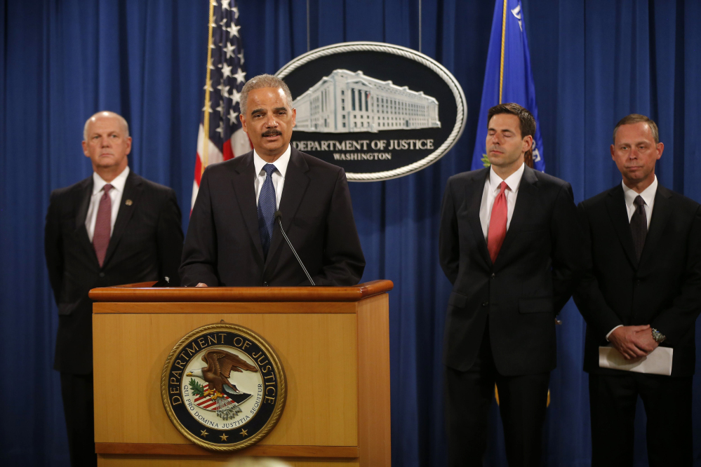 Attorney General Eric Holder announces Monday that a U.S. grand jury has charged five Chinese hackers with economic espionage and trade secret theft.