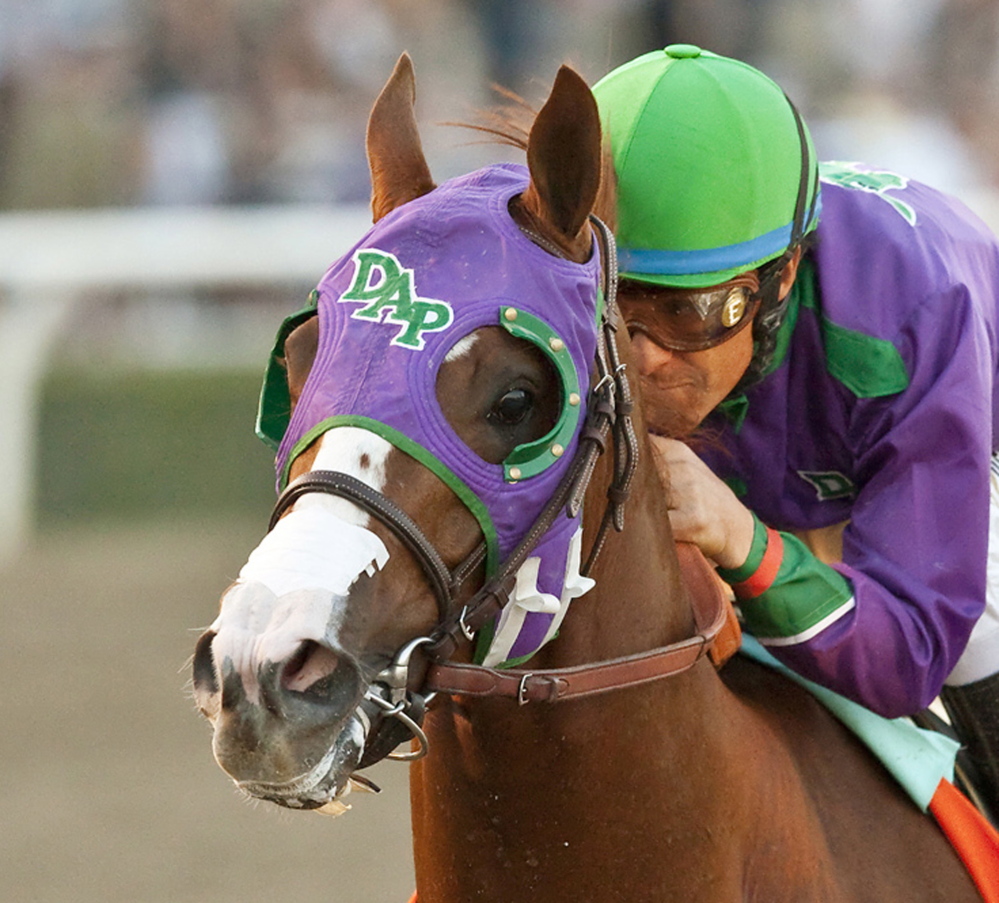 California Chrome, ridden by jockey Victor Espinoza, will be allowed to wear a nasal strip in the Belmont Stakes.