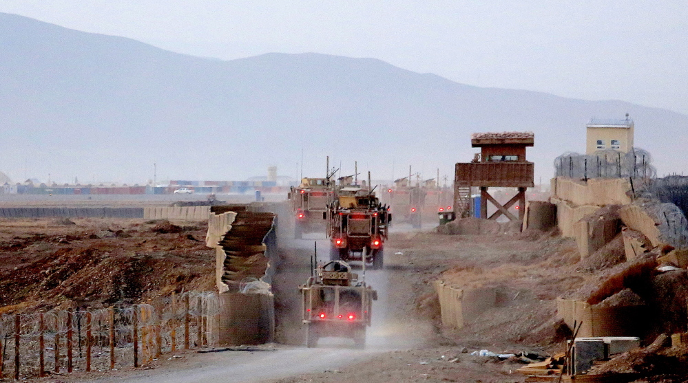 133rd: A group of gun trucks from the Convoy Escort Team of the 133rd Engineer Battalion of the Maine Army National Guard snake their way along the perimeter of Forward Operating Base Shank as they prepare to roll on a convoy to Bagram Air Field in December.