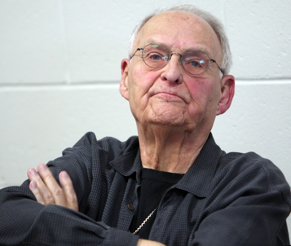 Wolfeboro, N.H., Police Commissioner Robert Copeland listens Thursday as town residents ask for his resignation after he was overheard using a racial slur to refer to President Barack Obama at a restaurant.