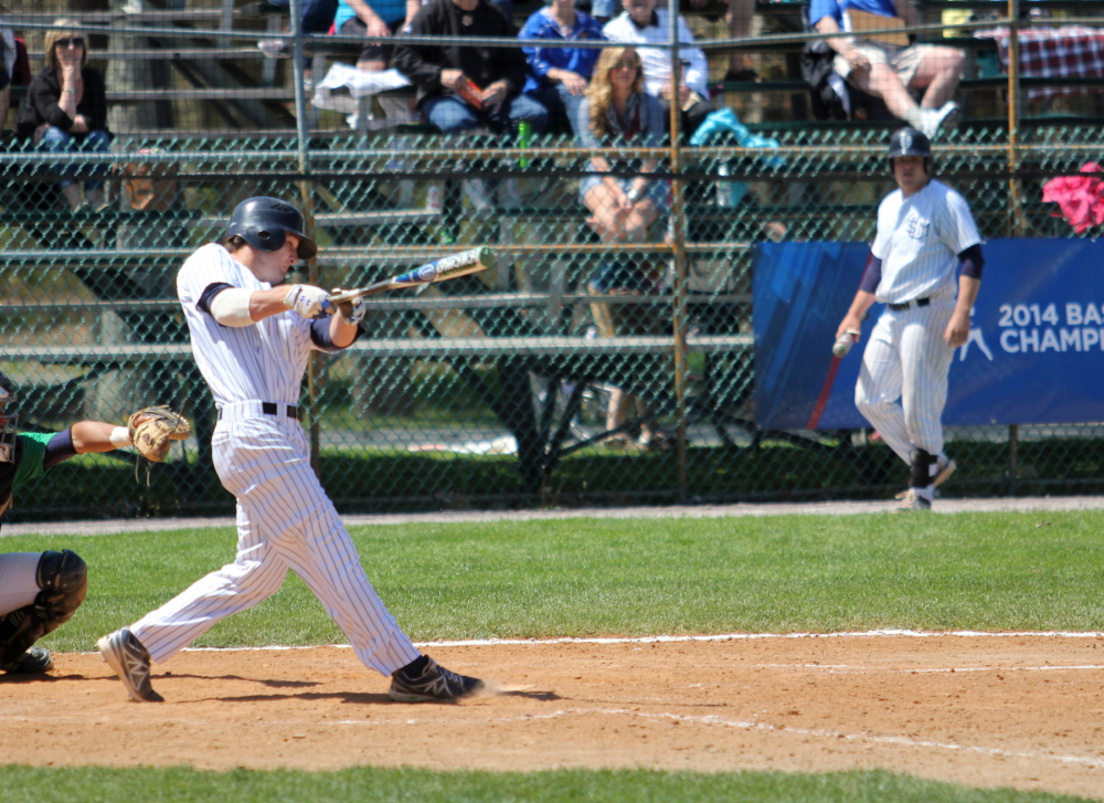 Forrest Chadwick, a Gardiner graduate, connects for a home run during the Div. III Eastern regional tournament last weekend. Chadwick is a big reason why the Huskies will play for the Div. III World Series.
