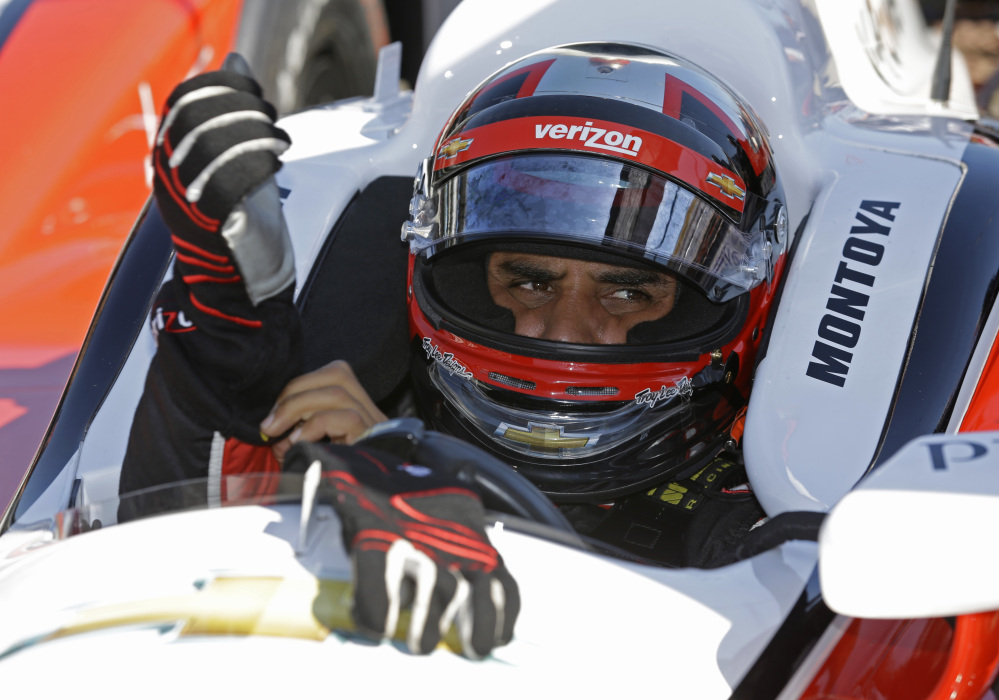 I got this: Juan Pablo Montoya puts on his gloves as he prepares at a recent practice for the Indianapolis 500 at the Indianapolis Motor Speedway in Indianapolis. The 98th running of the Indianapolis 500 is Sunday.