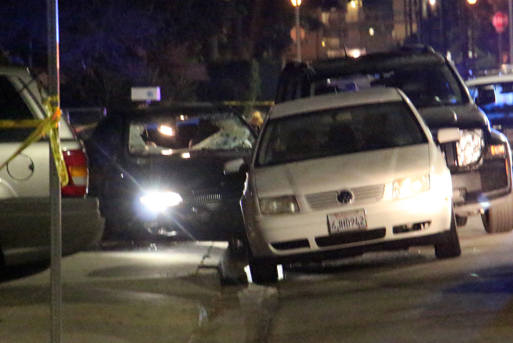 In this image provided by KEYT-TV, a car window is shot out after a mass shooting near the campus of the University of Santa Barbara in Isla Vista, Calif., late Friday night. A drive-by shooter went on a “mass murder” rampage near the Santa Barbara university campus that left seven people dead, including the attacker, and seven others wounded, authorities said Saturday.