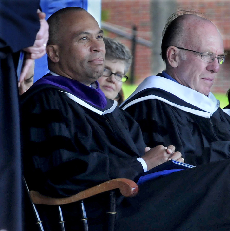 HONOR: Massachusetts Gov. Deval Patrick, left, listens as honorary degrees are conferred on recipients during the 193rd commencement at Colby College in Waterville on Sunday. Patrick gave the commencement address and received an honorary Doctor of Laws degree. Fellow degree recipient William Chace is at right.