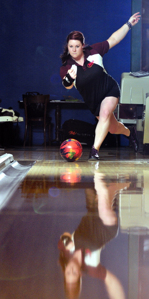 TOTAL FOCUS: Mallory Nutting throws a bowling ball recently at Sparetime Recreation in Hallowell. Nutting holds a 185 average.
