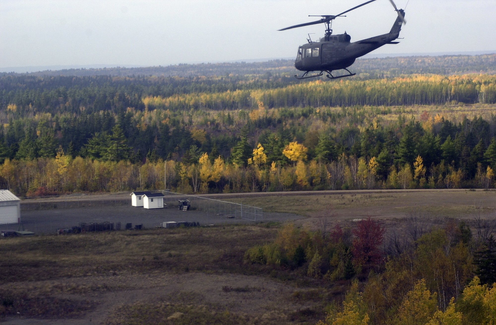 In this October 2001 file photo, a Maine Army National Guard helicopter approaches the Canadian Forces Base Gagetown in New Brunswick, Canada. Brig. Gen. James Campbell, the commander of the Maine National Guard, went to Washington, D.C., last year without Gov. Paul LePage’s knowledge to pitch a plan to convert a combat communications squadron based in South Portland into a cyber security unit, according to two people with direct knowledge of the trip,