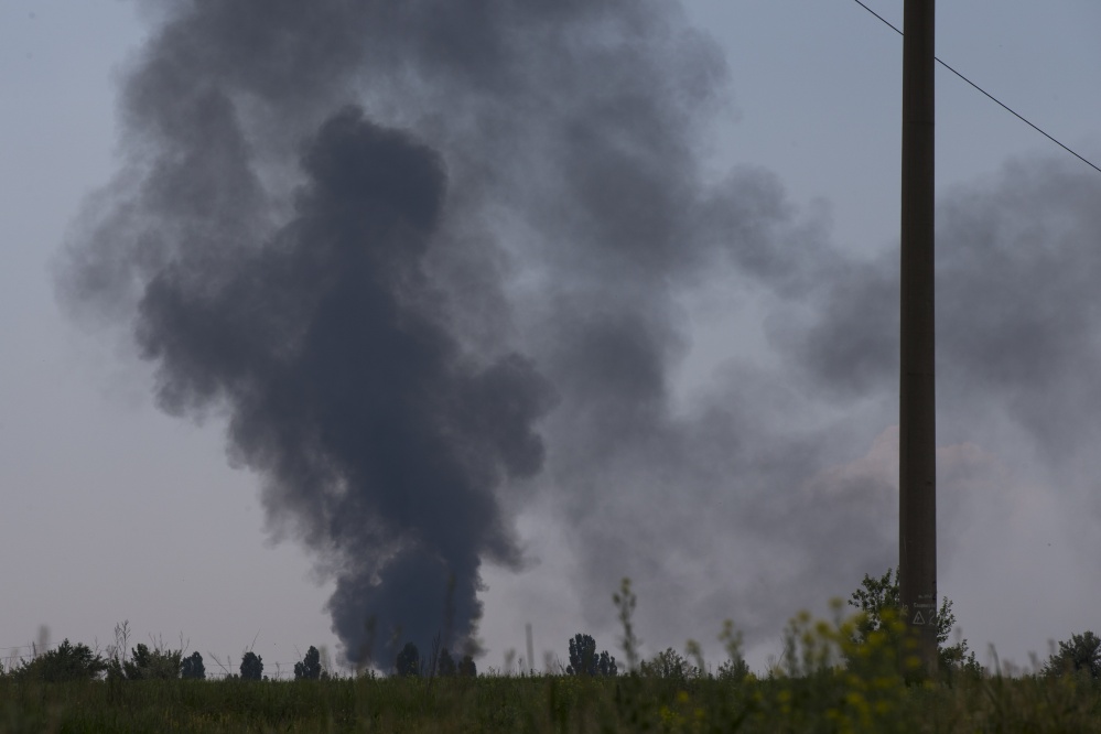 Black smoke rises from a shot-down Ukrainian Army helicopter outside Slovyansk, Ukraine, on Thursday.