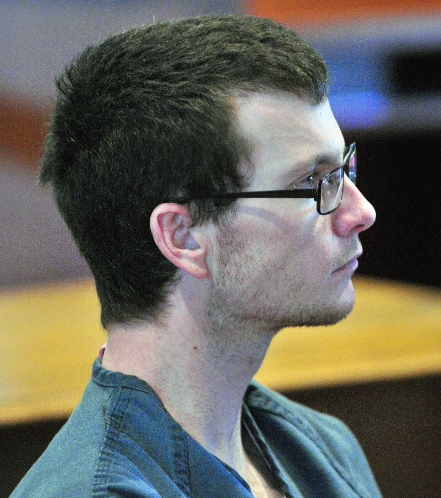SENTENCED: Jacob Hitchcock sits in Kennebec County Superior Court in Augusta during his sentencing on Thursday. He was given seven years with all but 27 months suspended for two assaults last fall in Hallowell.