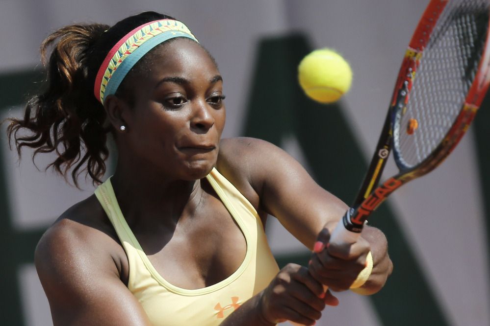 Sloane Stephens of the U.S. returns the ball during the third-round match at the French Open against Russia’s Ekaterina Makarova in Paris on Saturday. Stephens won in two sets 6-3, 6-4.