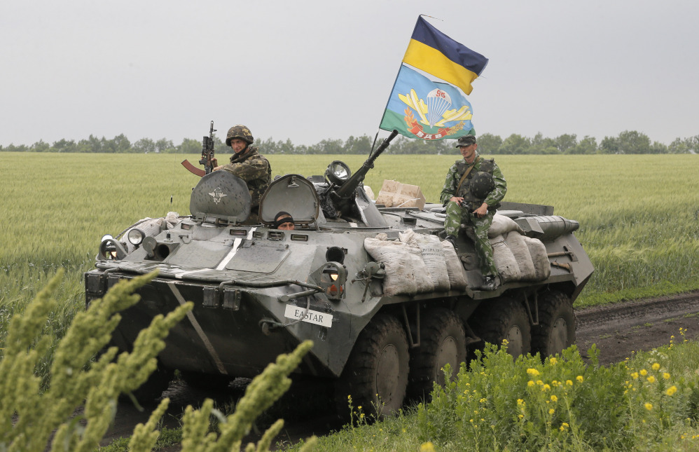 Ukrainian army paratroopers move to position in Slovyansk, Ukraine, on Saturday. The Ukrainian Acting Defense Minister said on Friday that troops had ousted separatists from southern and western parts of the Donetsk region and north of the Luhansk region.